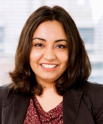 a woman smiling for a portrait