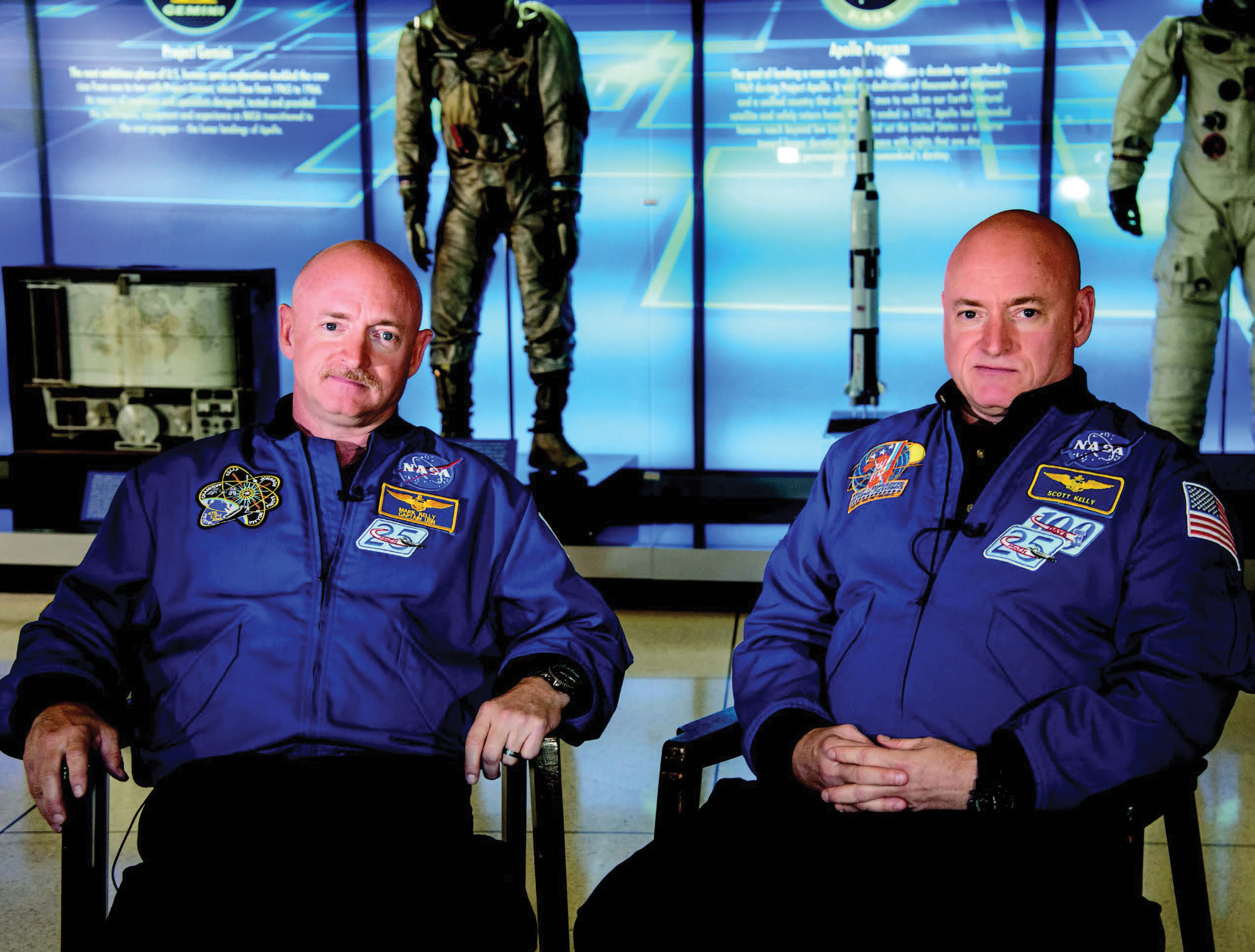 MIRROR IMAGES: Twins Mark (left) and Scott Kelly. Opposite page: Scott on a spacewalk—his third—in  December 2015.