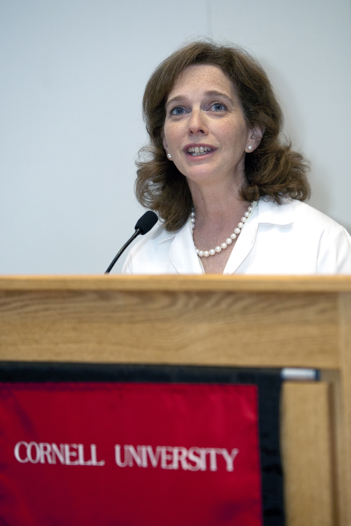 "The process of becoming a doctor is not just a road to a job," said Dr. Shari Midoneck. "It is the beginning of a profession, a calling, if you will. You will have the power to influence people's lives every day." Dr. Shari Midoneck