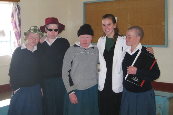 Nora Ward and patients at the albino outreach clinic.
