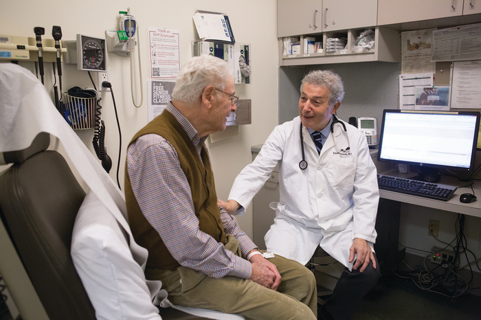 STAYING ACTIVE: Dr. Ronald Adelman (right), sees patient Gilbert Boas at the Irving Sherwood Wright Center on Aging.