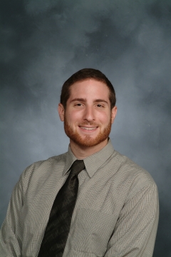 A man posing for a photo