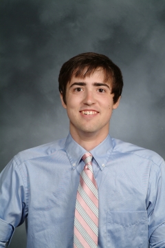 A man smiling for a photo