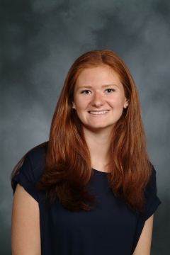 a woman smiling for a photo