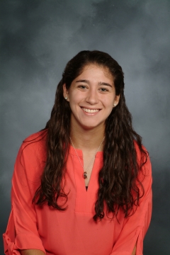 a woman smiling for a photo