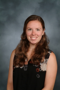 a woman smiling for a photo