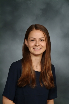 a woman smiling for a photo