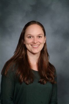 a woman smiling for a photo