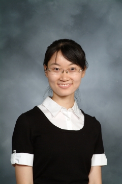 a woman smiling for a photo