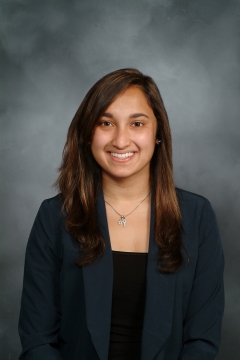 a woman smiling for a photo