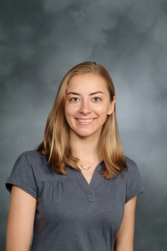 a woman smiling for a photo