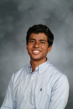 A man smiling for a photo