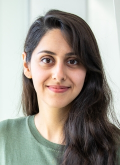 a woman smiling for a portrait