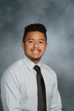 A man smiling for a photo